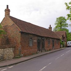 Row Of Almshouses At Corner Of Church Street