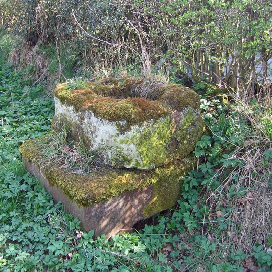 Cross base on south side of Longstone Lane 100m WNW of the entrance to Cobden Farm