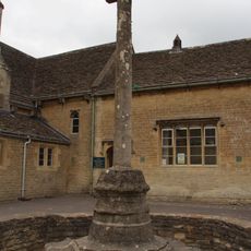 Village Cross In Schoolyard