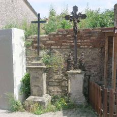 Kříže v Husově ulici v Kostomlatech pod Milešovkou