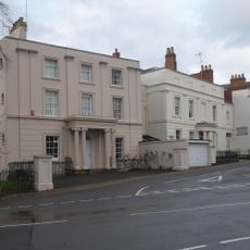 Numbers 1 And 1A And Attached Railings