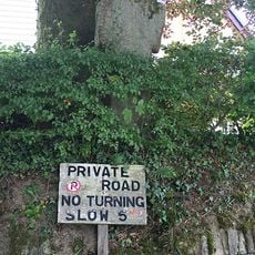 Wayside cross at Halwill on a roadside 40m south east of the church