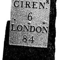 Milestone, opp. Marston Meysey Caravan Park; E of bus shelter.