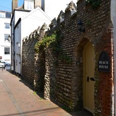 Rear Garden Wall Of Beach House