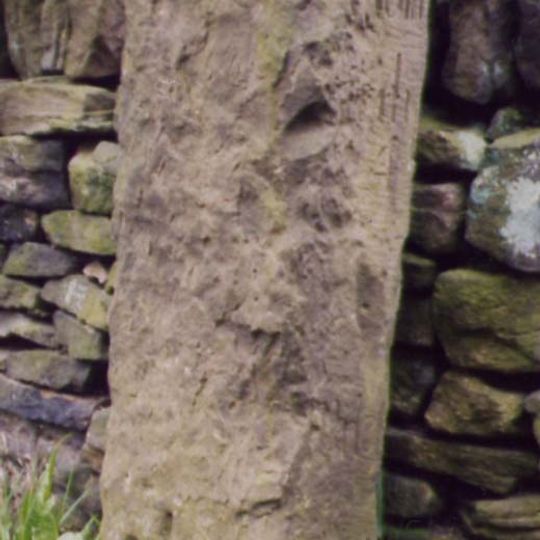 Milestone, Upper Cumberworth, S of A635 at jct of Carr Hill Road and Rowgate, beside white gable end