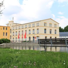 Ehemaliges Produktionsgebäude der Textilfabrik August Hempel, heute Gemeindezentrum Hauptstraße 19