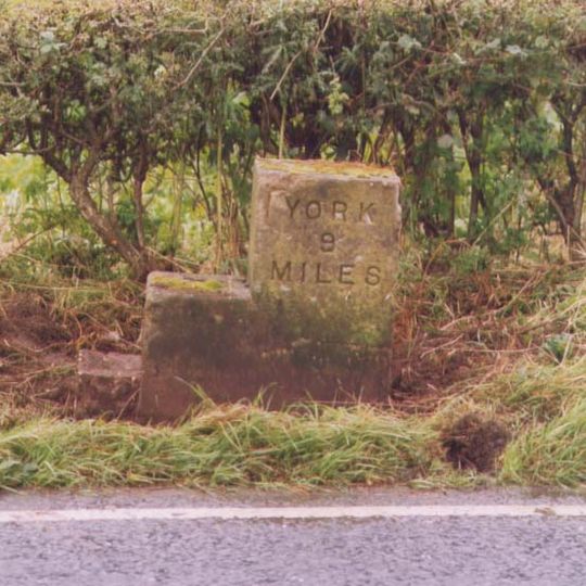 Milestone, Concrete Post, W of entrance to High Burtonfields Farm