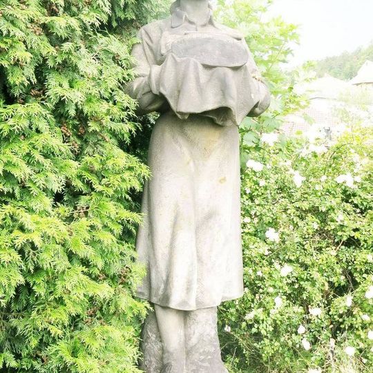 Socha vítající ženy na 1.nástupišti hlavního nádraží Děčín