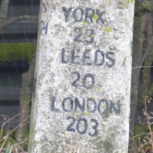 Milestone, opp Scarah Farm buildings