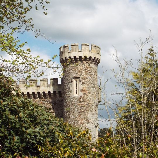 Garden wall with gateways and folly tower attached to west and east of Caerhays castle