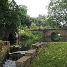 Bridge And Boat House With Associated Basin At East End Of Lower Lake