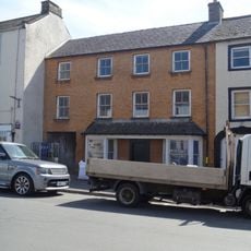 Building Between One-Stop Shop And Post Office