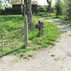 Smírčí kříž v Palackého ulici v Kamenickém Šenově