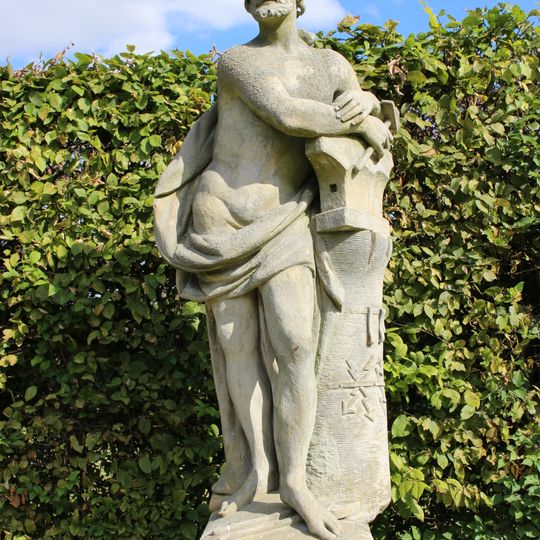 Socha bůh Vulkán v zahradě zámku v Lysé nad Labem