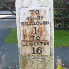 Milestone, Leicester Road, by No. 96
