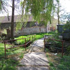 Lávka přes Tuklatský potok v Tuklatech v prodloužení ulice U Lávky