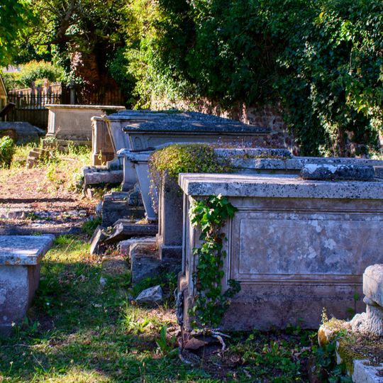 Row Of 10 Chest Tombs And One Table Tomb Against The South East Of Churchyard Wall Of The Church Of St John The Baptist