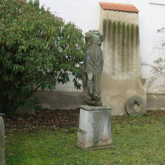 Torzo sochy svatého Peregrina v lapidáriu u hradu v Budyni nad Ohří