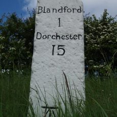 Milestone, 25m N of small layby