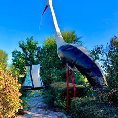 Jug and wandering stork