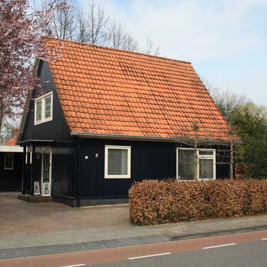 Houten woonhuis van het type OW