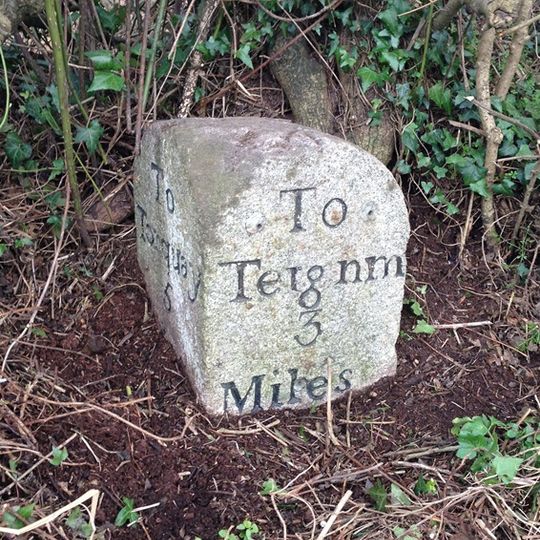 Milestone, Teignmouth Road, Lower Gabwell, opp. and to N of jct with Deane Lane