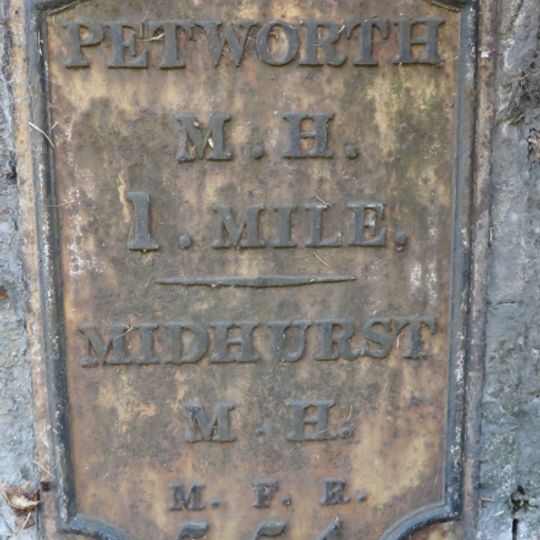 Milestone, Tillington Cottage, 100m E of junction with Upperton Road