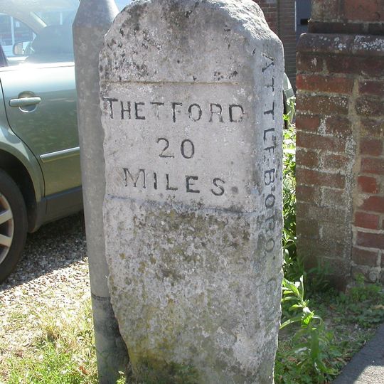 Milestone, Norwich Road, by Red Cross shop, N of Bridewell Museum