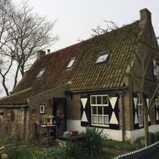 Karakteristiek Amelander huis onder zadeldak tussen topgevels