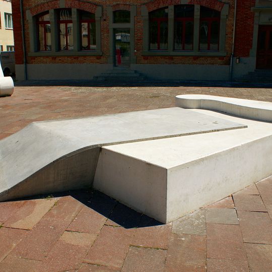 Sessel und Bett auf Teppich