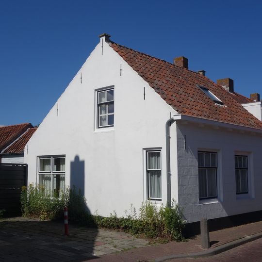 Arbeidershuisje met gepleisterde gevel