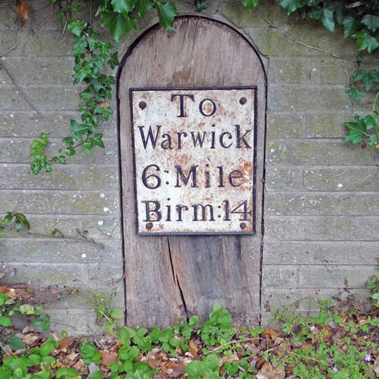 Milepost, opp. Church gate nr entrance to Rowington Hall
