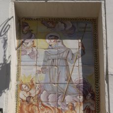 Ceramic panel of Saint Francis of Assisi at L'Ereta street