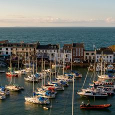 The Quay From Royal Britannia Hotel On West To Pier Hotel On East Including Old Quay Head