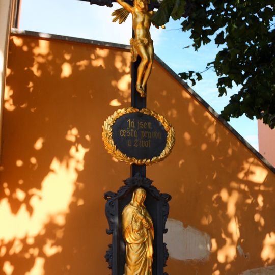 Wayside cross in front of the church