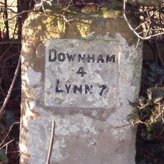 Milestone, Lynn Rd, 140yds N of School Rd