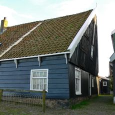 Perceelsgedeelte van een houten huis