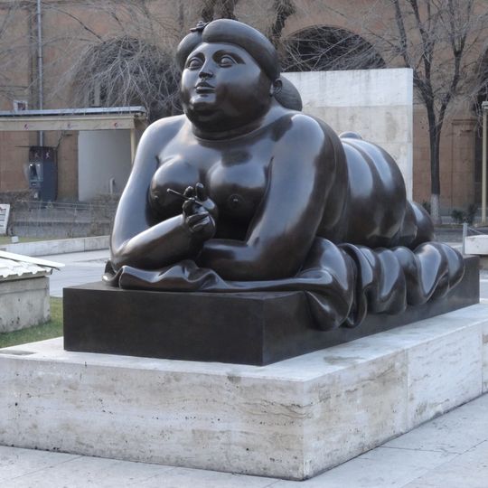 Mujer Fumando un Cigarrillo