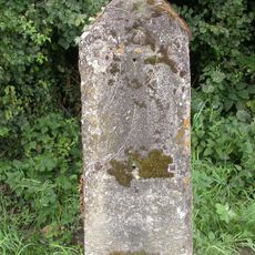 Milestone, Tetbury Hill; opp. new housing development 100m S roundabout