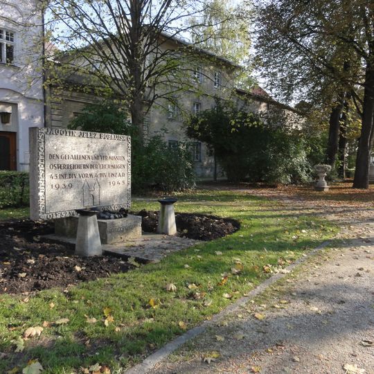 Former city moat, remains of walls and small monuments