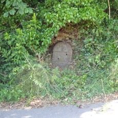 Milestone, centre of village