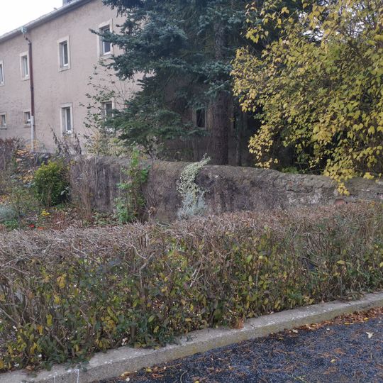 Rest der Bruchsteinmauer des Vorgartens An der Promnitz 19