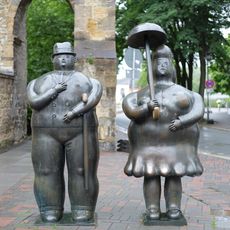 Frau mit Schirm