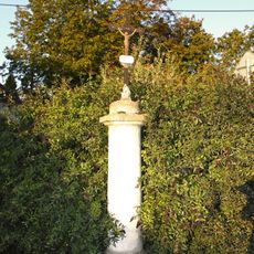 Kříž v Husově ulici v Přešticích