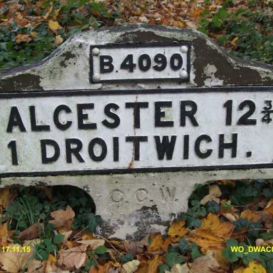 Milestone, Hanbury Road, E of M5 flyover, W of Hanbury Wharf