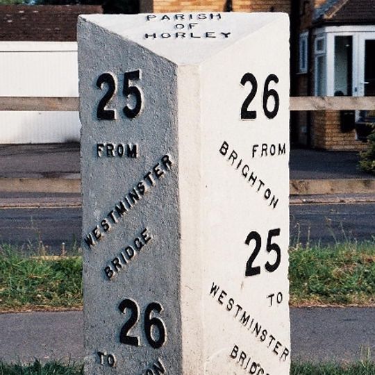 Milepost, Brighton Road, opp. parish church, NE of Longbridge roundabout