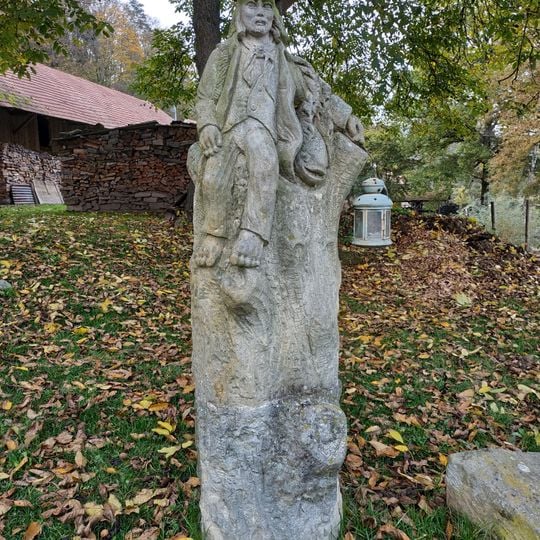 Socha vodníka nad Berounkou u Krašova