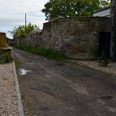 Garden Wall Attached To South Of Number 16 (Bamburgh House)