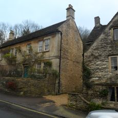 Hillside House With Wall And Gatepiers