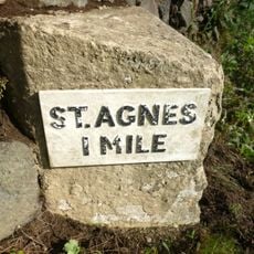 Milestone, N of filling station, before St Agnes Leisure Centre